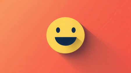 A cheerful smiling face in flat design features a bright yellow color against a vibrant orange backdrop, creating a sense of joy and simplicity.の素材