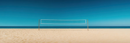 A beach volleyball court stands empty on golden sand, fronting a deep blue ocean under a clear sky, inviting relaxation and play.の素材