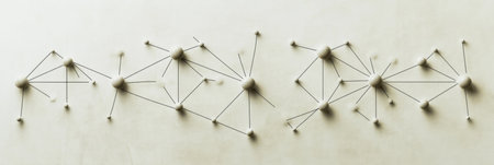 Abstract shapes and connecting lines create a network of nodes on a light background, offering space for additional text or graphics below.の素材