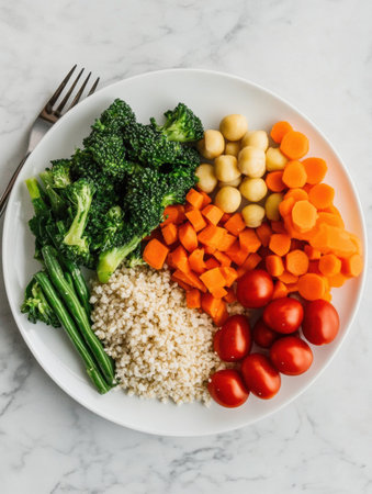 A top-down view of a white plate featuring vibrant vegetables, whole grains, and lean protein, showing a minimalist and healthy eating aesthetic.の素材
