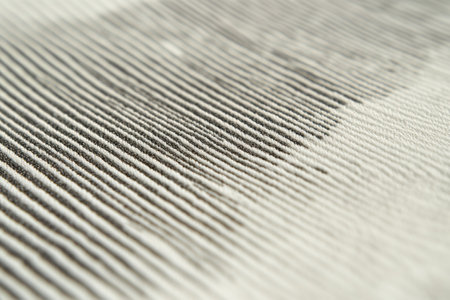 Subtle three-dimensional effect emerges from fine parallel lines in soft monochrome shades, creating an intriguing optical illusion with delicate aesthetics.の素材