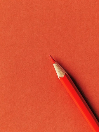 A red pencil clearly marks a checkbox on ballot paper, representing a political choice during an election process in a simple and minimalistic environment.の素材