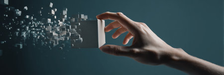 A hand extends into a digital portal, reaching for a floating parcel composed of smaller cubes, illustrating the fusion of technology and tangible objects.の素材