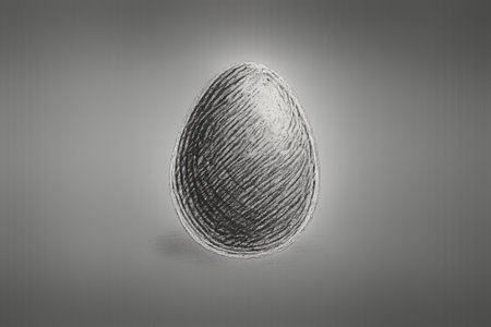 A black egg stands prominently against a soft gray surface, highlighting its unique texture and minimalist aesthetic that captivates the viewers attention.の素材