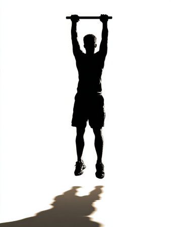 Silhouette of a person performing a pull-up against a bright background with a noticeable shadow. Highlighting strength and fitness in training.の素材