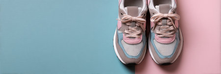 Colorful sporty sneakers are displayed against a pastel background, emphasizing their stylish design and comfortable features, ideal for active lifestyles.の素材