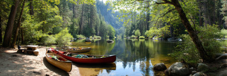 Families enjoy a picnic by the calm riverbank with canoes pulled ashore in a serene forest.の素材