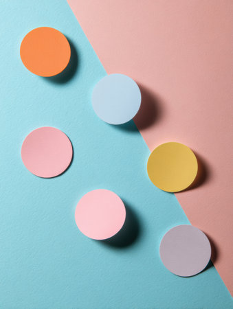 Six cute round stickers sit playfully on a pastel background, creating a soft, organized look perfect for design inspiration.の素材