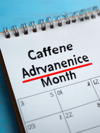 Calendar page emphasizes Caffeine Awareness Month with clear text and a vibrant sky-blue background, promoting awareness around caffeine consumption.の素材