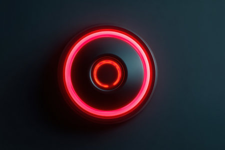 A glowing reset button illuminates a clean surface, casting an eerie light that hints at potential changes or new beginnings in a dark environment.の素材