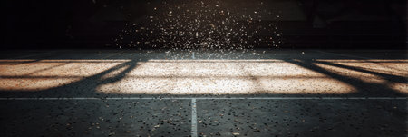 Confetti drifts down onto a deserted court, highlighted by dramatic shadows and a clear area above, evoking a sense of celebration and anticipation.の素材