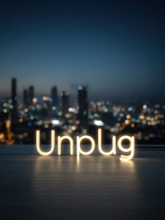 A glowing unplug symbol shines brightly over a vibrant city skyline at night, encouraging a break from technology and urban life for relaxation.の素材