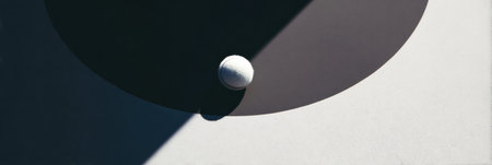 A white ball sits alone on the center court circle, casting sharp shadows, creating a minimalist composition with clarity on the right side.の素材