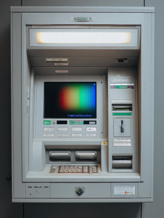 A touchscreen ATM with a distorted display shows a critical fault message while maintaining a clean and organized top layout, indicating a malfunctionの素材