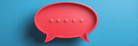 A red speech bubble displays dots, representing social engineering themes in digital conversation, emphasizing security awareness in online interactions.の素材