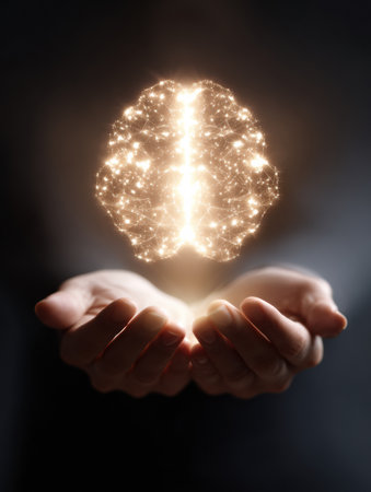 Hands uplift a glowing mind symbol, embodying the essence of mental wellness and emotional support during a calm, reflective moment.の素材