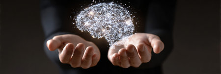 Hands support a luminous mind symbol that signifies the importance of mental wellness and the nurturing of mental health and cognitive well-being.の素材