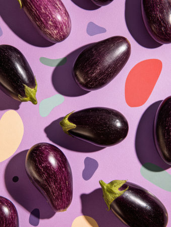Brightly colored eggplants are artistically placed on a purple backdrop featuring abstract shapes, highlighting their rich texture and hue.の素材