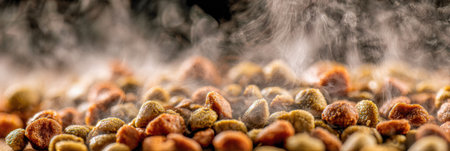 Aromatic, steaming pet food showcases rich textures and vibrant colors, inviting pets to indulge against a softly blurred background.の素材