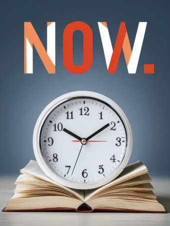 A clock with hands directed at the word now alongside an open book highlights the significance of living in the present and fostering personal growth.の素材