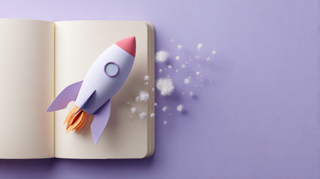 A colorful 3D paper rocket launches from an open notebook against a soft pastel background, symbolizing creativity and the power of imagination in design.の素材