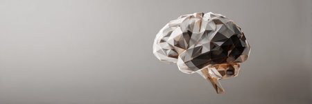 A low-poly human brain crafted from geometric shapes is presented against a neutral backdrop, emphasizing its unique design and sculptural quality.の素材