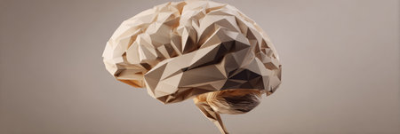 Stylized low-poly representation of a human brain displayed against a neutral backdrop, showing the intricate geometric design and form from one side.の素材