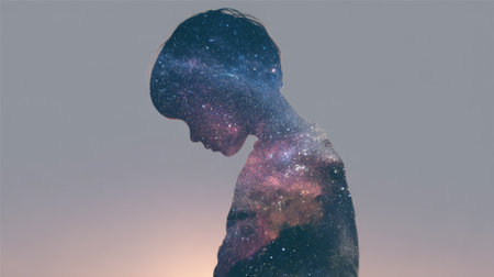 A thoughtful child silhouette filled with a vibrant galaxy and stars, showcasing curiosity and imagination amidst a soft, faded cosmos backdrop.の素材
