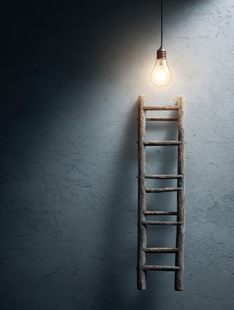 A wooden ladder leans against a textured wall, reaching up towards a brightly glowing light bulb, symbolizing the pursuit of knowledge and ideas.の素材