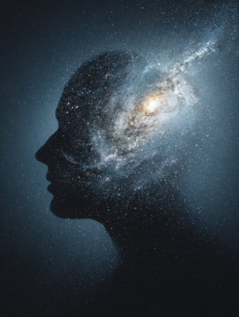 A human silhouette shows a galaxy within, symbolizing the boundless potential of imagination against a dark cosmic backdrop.の素材