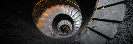 Unique spiral staircase resembling a brain offers a distinct perspective from above, highlighting modern design and thoughtful architecture in a unique spaceの素材