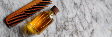 Flatlay features a retro comb and a bottle of oil arranged on a marble surface, designed for showcasing beauty products in a clean layout.の素材