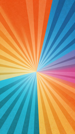 Bright and colorful rays radiate from the center, blending orange, blue, and pink hues in an uplifting abstract background perfect for various applications.の素材