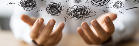 Two hands reach out, symbolizing a struggle with chaotic thoughts, capturing a moment of introspection and emotional turmoil.の素材