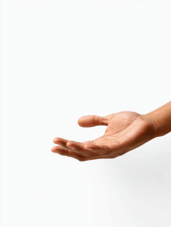 A hand is extended outward into a bright, empty background, symbolizing the offering of help and support in a moment of need.の素材