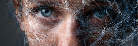 A human face reveals intense emotion through an overlay of chaotic nerves, illustrating the complexities of anxiety and mental struggle beautifullyの素材