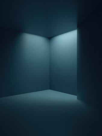 A small, dark room showcases a corner illuminated by soft lighting, creating an atmosphere of tranquility and introspection during evening hours.の素材