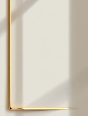 Golden frame creates a contrast with soft shadows on a light wall, highlighting the interplay of light and shape in the afternoon glow.の素材
