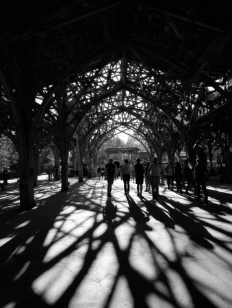 Characters create long shadows as they walk through a beautifully structured area, sunlight casting dynamic patterns on the ground during late afternoon.の素材