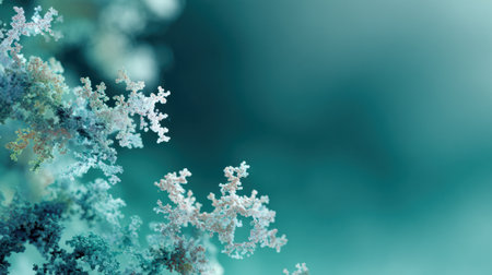 Delicate coral formations flourish in a serene underwater setting, showcasing intricate details against a calm backdrop of blue and green hues.の素材