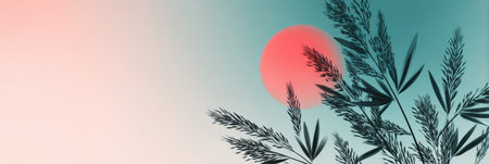 Leaves create a striking silhouette as a vibrant sunset fills the sky with shades of pink and blue, capturing a peaceful evening atmosphere.の素材