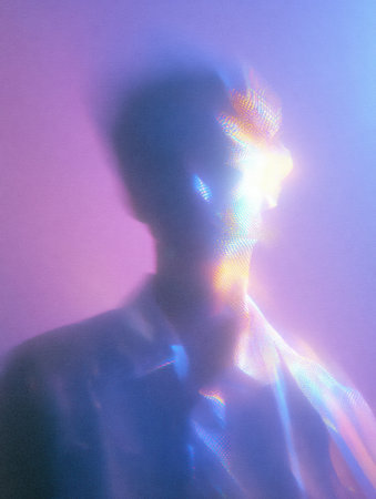 A striking figure illuminated by vibrant hues and soft light, set against a dreamy purple backdrop. The composition creates an otherworldly atmosphere.の素材