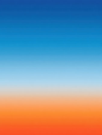 The sky transitions smoothly from deep blue at the top to bright orange near the horizon, creating a stunning sunset view that evokes tranquility.の素材