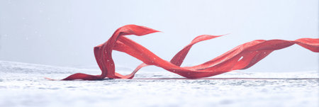 A striking red material dances in the breeze above a tranquil snowy scene, capturing the essence of calm in a winter environment.の素材