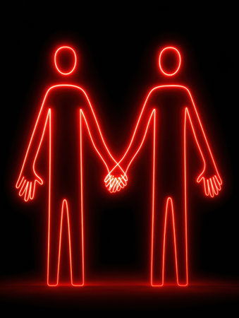Bright red neon outlines of two figures holding hands together create a strong visual representation of connection and love in a modern aesthetic.の素材