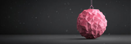 A pink geometric ornament hangs in a minimalistic setting, featuring sharp angles and smooth texture against a dark background.の素材