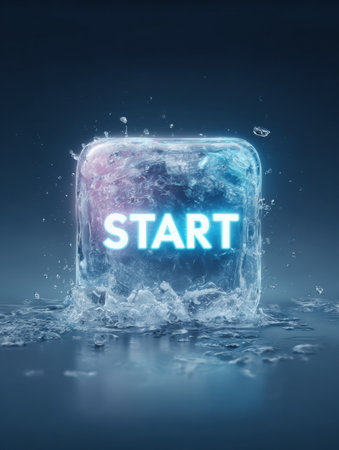An illuminated ice cube displaying the word start sits in a dark environment, surrounded by glistening water droplets, creating a captivating effect.の素材