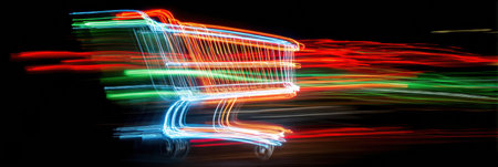 A shopping cart is in motion, illuminated by colorful light trails in a bustling city scene at night, creating a dynamic and energetic atmosphere.の素材