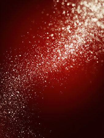 Golden particles swirl and shimmer against a deep red backdrop, producing an enchanting display that evokes feelings of warmth and celebration.の素材