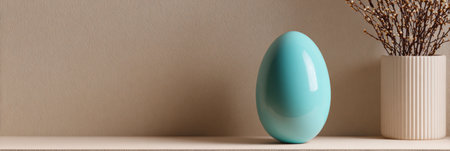A decorative turquoise egg sits on a simple shelf next to a vase filled with dry twigs, all bathed in soft natural light, creating a serene atmosphere.の素材
